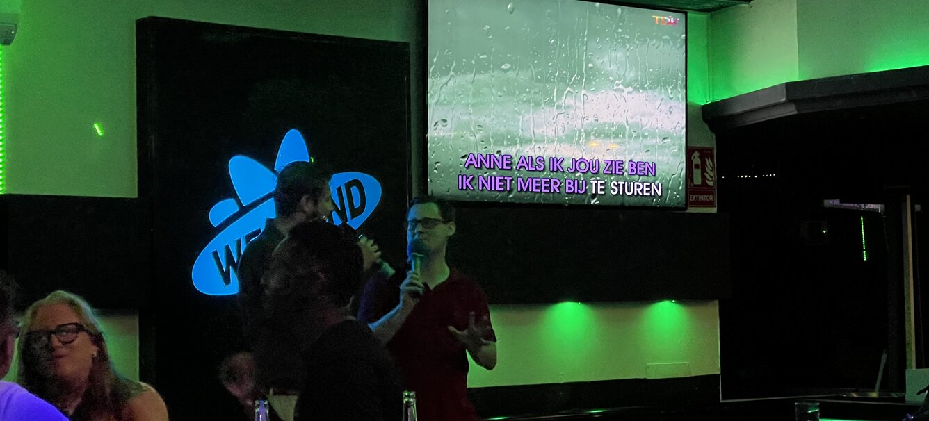 2 guys doing karaoke